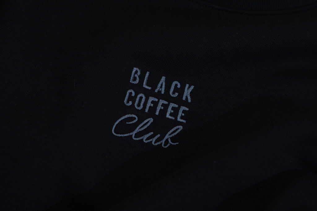 'Black Coffee Club' text on a black background