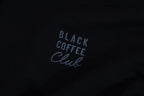 'Black Coffee Club' text on a black background