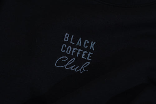 'Black Coffee Club' text on a black background