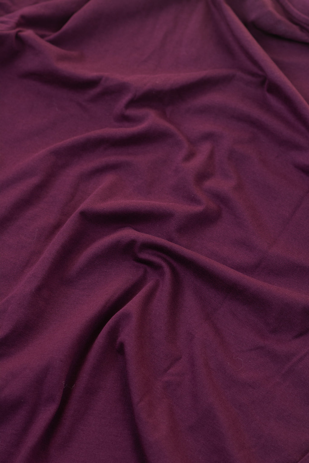Close-up of purple fabric with folds
