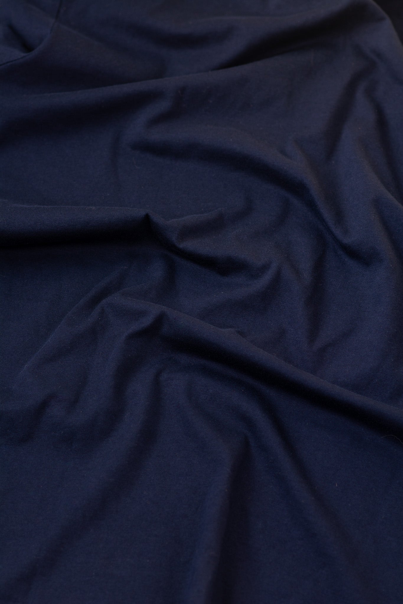 Navy blue fabric with folds