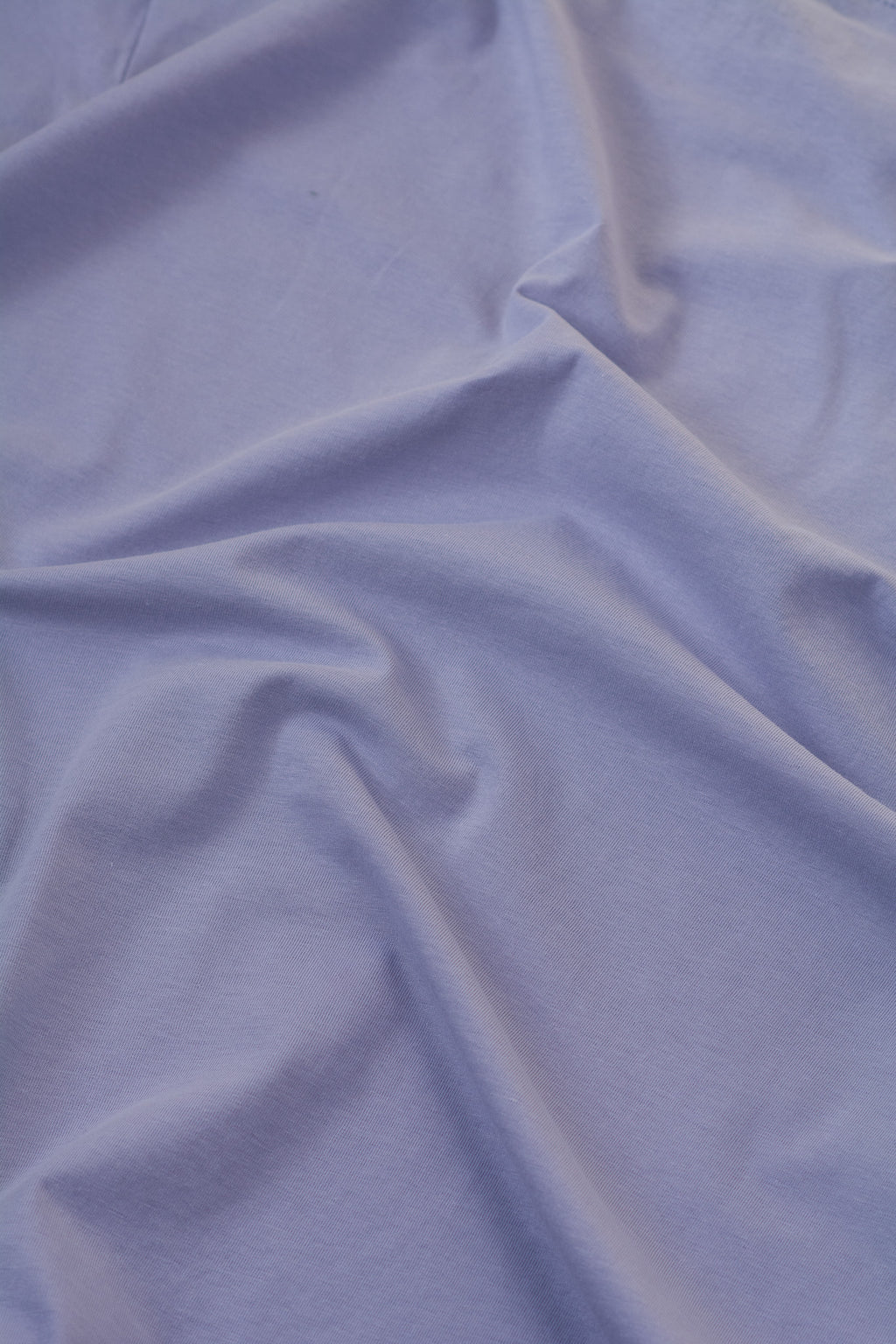 Close-up of light blue fabric with visible texture