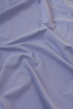 Close-up of light blue fabric with visible texture