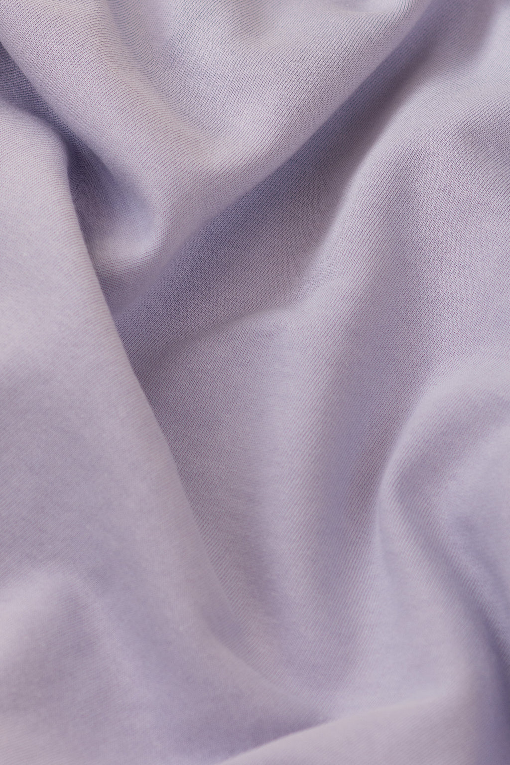 Close-up of purple fabric with folds