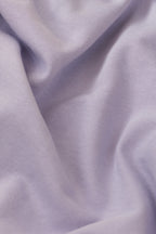 Close-up of purple fabric with folds