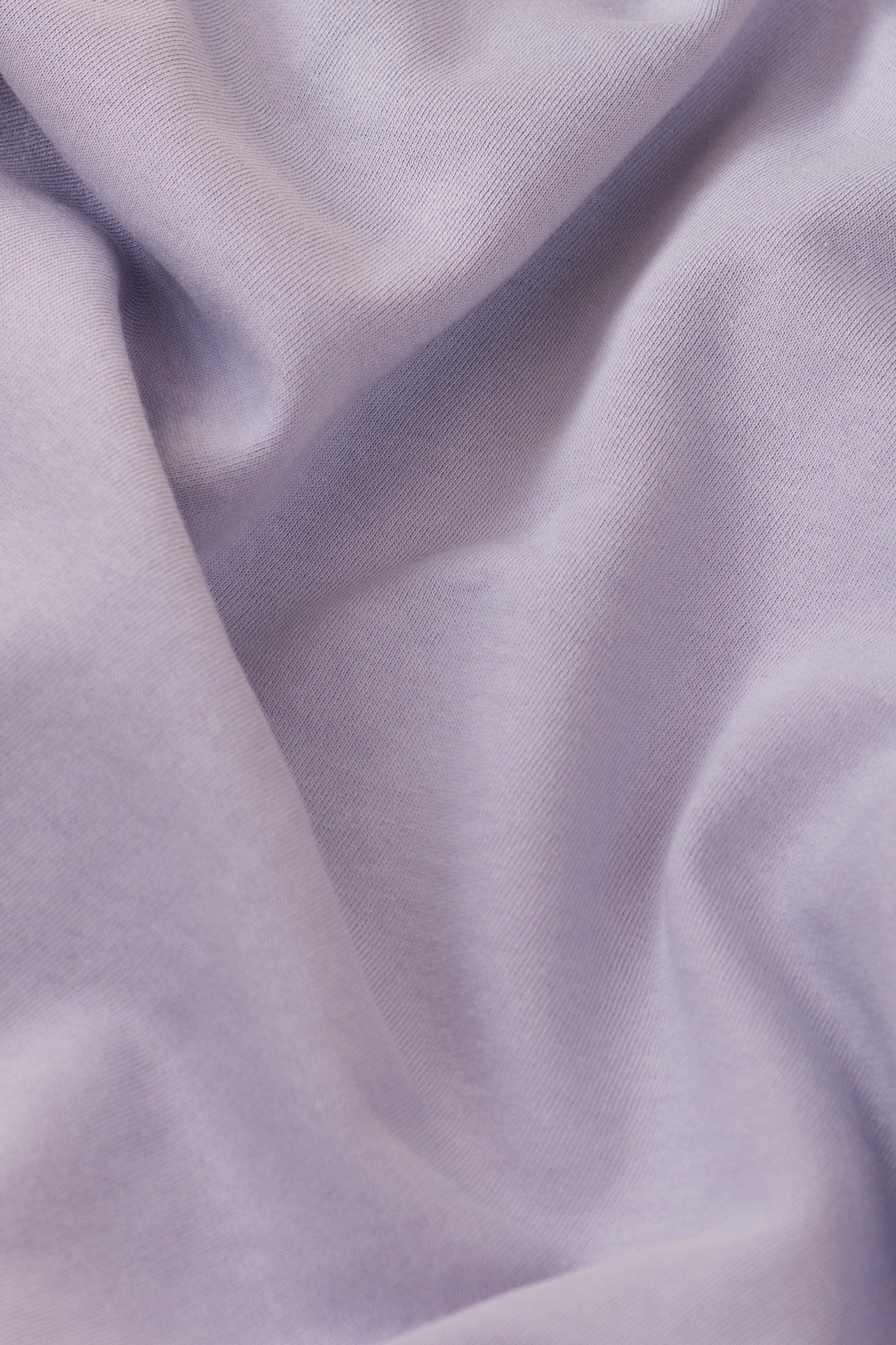 Close-up of purple fabric with folds