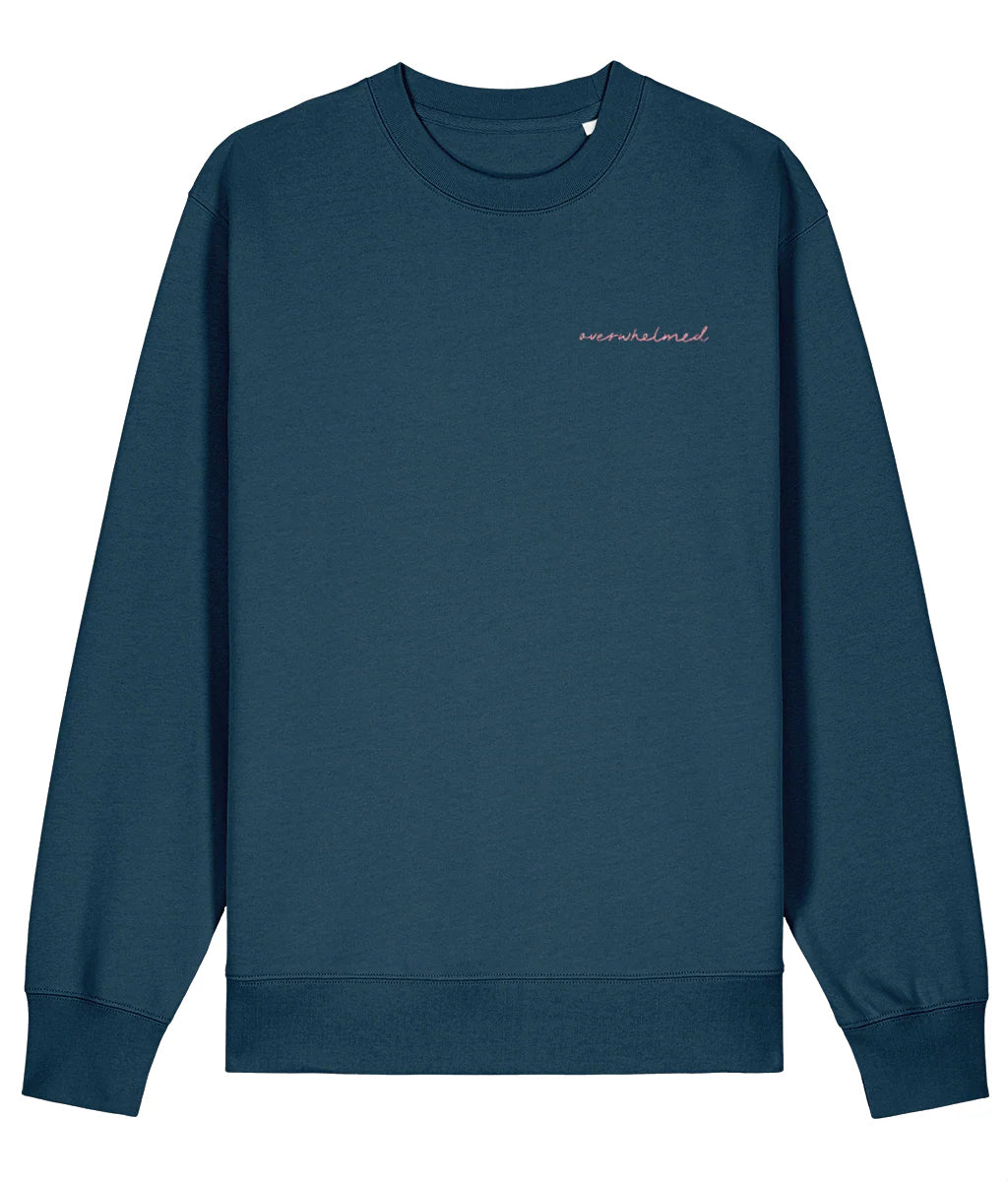 Navy blue sweatshirt with 'unravelled' embroidery on a white background